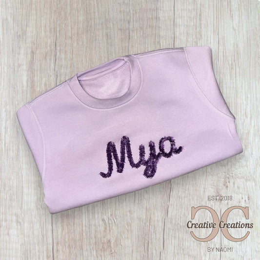 Sweater with Fringed font